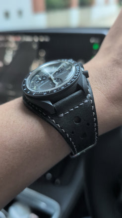 Upgrade your MoonSwatch with a bespoke Black Rally Bund. 100% handmade leather strap for Mission to the Moon & Mercury. Hand-stitched in HK. Shop Eternitizzz.co