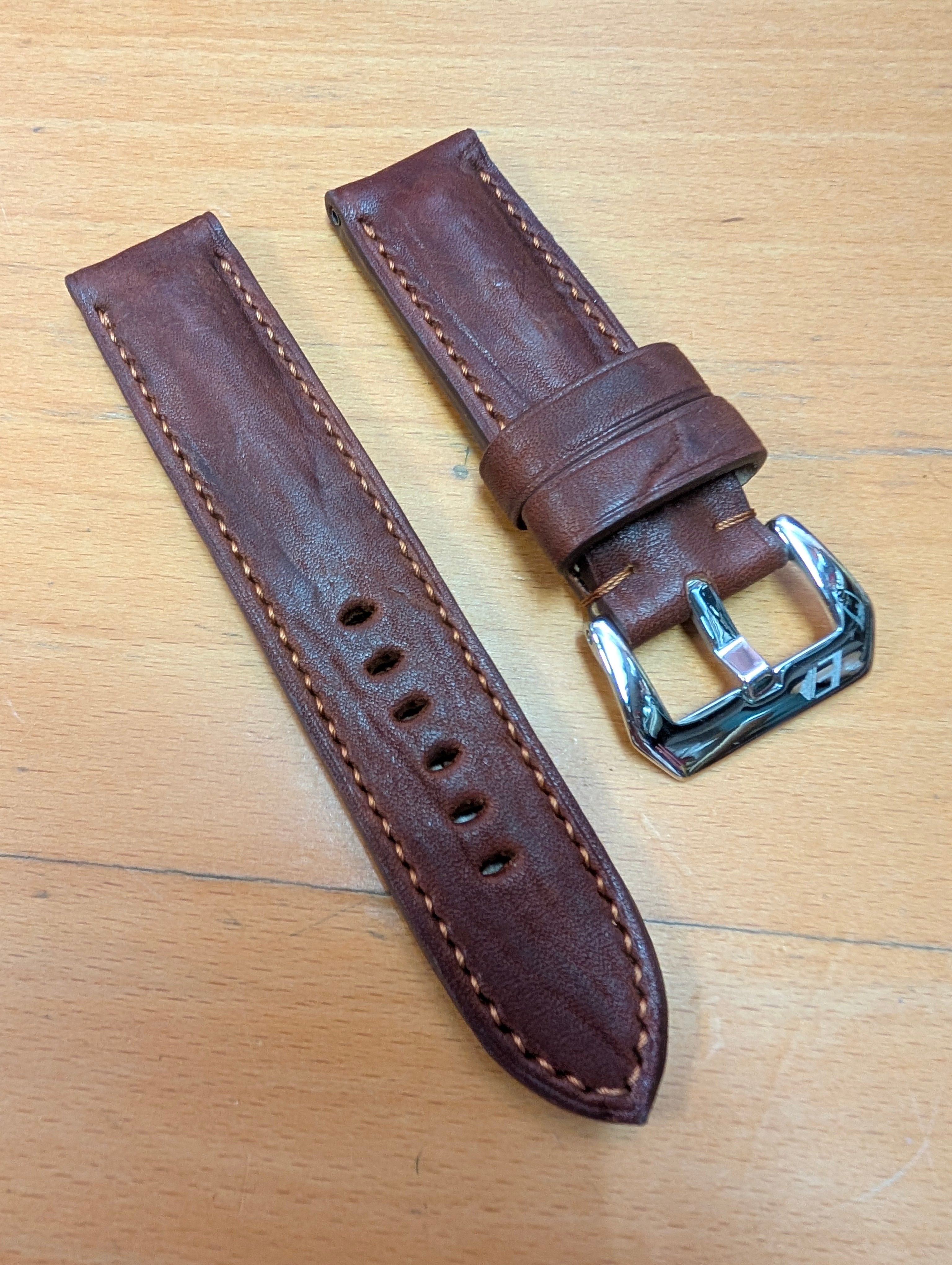 Back view of handmade Italian leather watch strap showing lining and edge finishing.