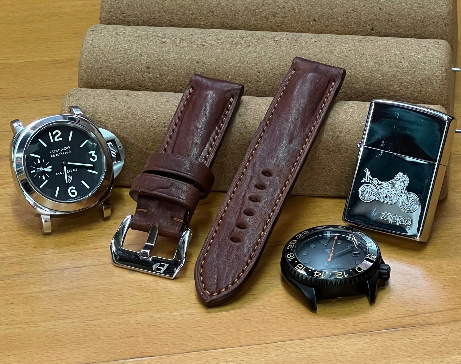 Handmade vintage brown Italian leather watch strap in 24mm with padded design and brown stitching.
