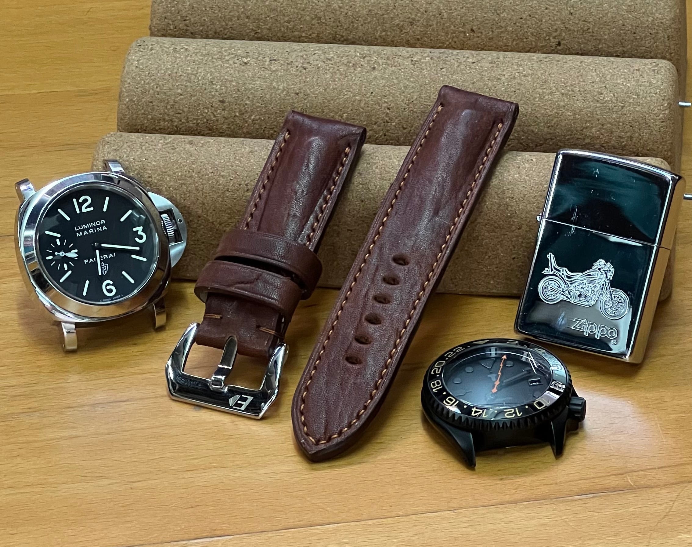 Handmade vintage brown Italian leather watch strap in 24mm with padded design and brown stitching.