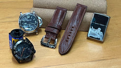 Close-up showing natural patina and color depth of the vintage brown Italian leather watch strap.