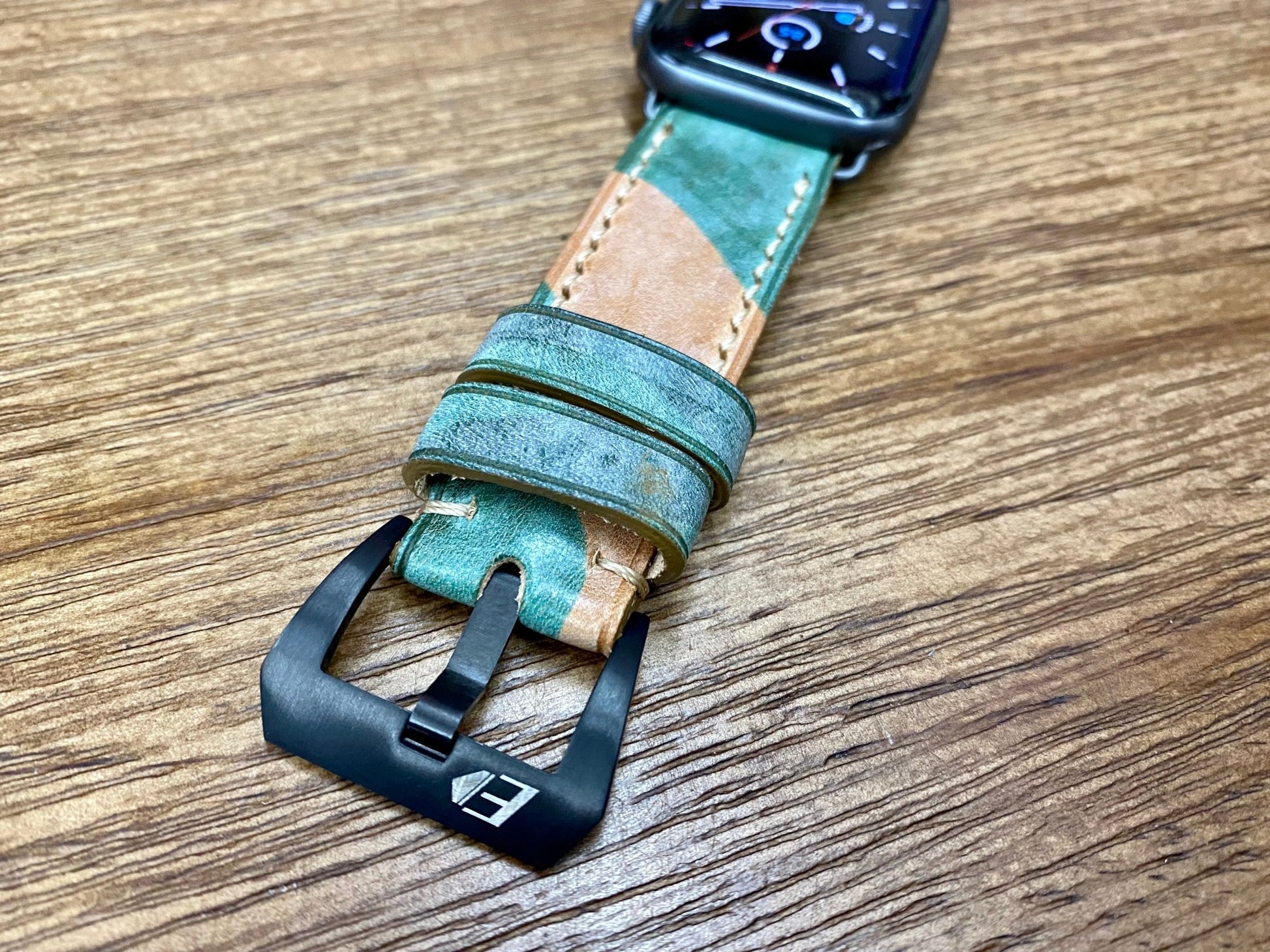 Apple Watch Band in Light Brown Genuine Leather Ghost Camouflage pattern that fit for Apple Watch 44mm Series 6 and 40mm Series 5, Stainless Steel Black brushed buckle and match with Apple Watch Space Grey watch case